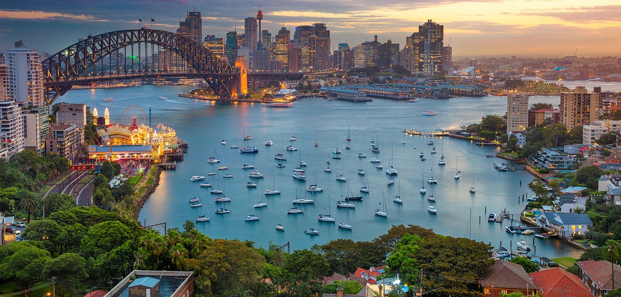 Spectacular view of the Sydney Harbour Bridge, reflecting in the water.