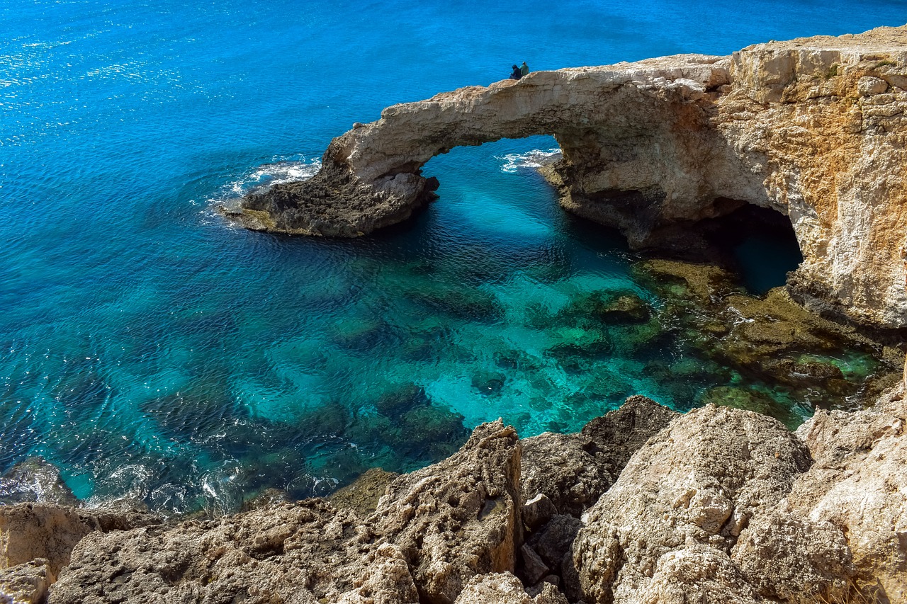 Breathtaking cliffs and blue waters at Cape Greco National Park.