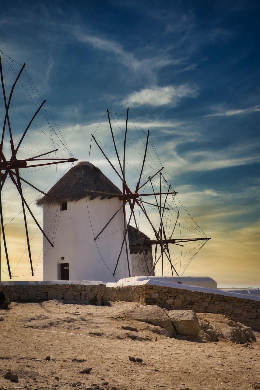 Iconic windmills of Mykonos overlooking the Aegean Sea