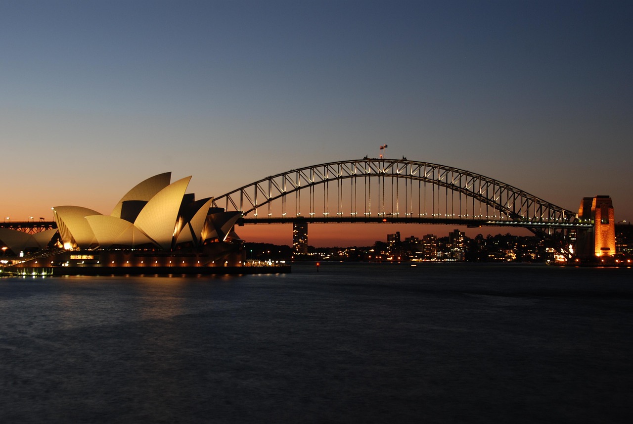 Iconic view of the Sydney Opera House, a masterpiece of modern architecture overlooking the sparkling harbor.
