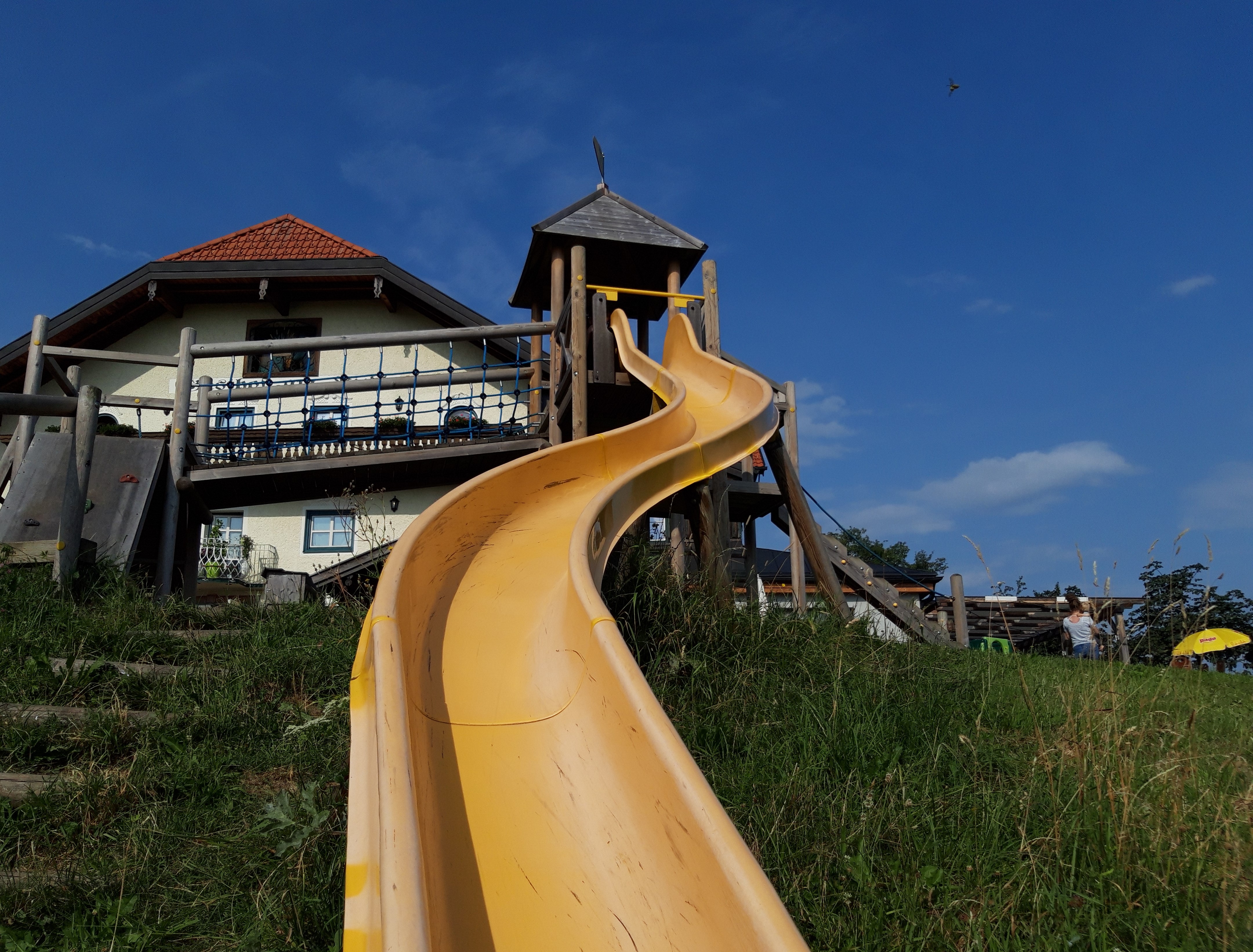 Family Travel in summer hotel with waterpark
