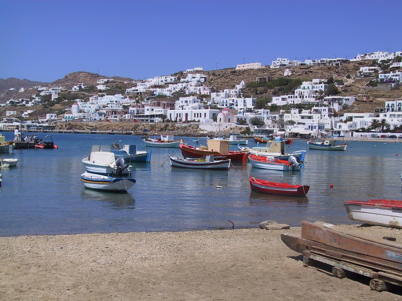 Iconic windmills of Mykonos overlooking the Aegean Sea.