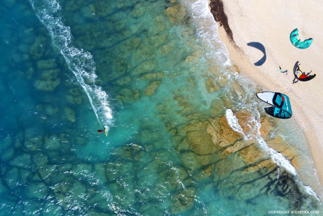 Windsurfers enjoying the calm waters of Vassiliki Beach.